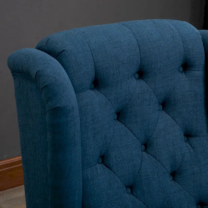 Fauteuil d’appoint capitonné à boutons avec dossier à oreilles haut, accoudoirs arrondis rembourrés et assise épaisse rembourrée, bleu