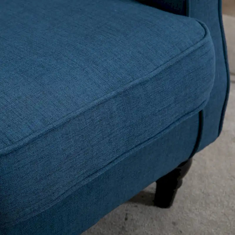 Fauteuil d’appoint capitonné à boutons avec dossier à oreilles haut, accoudoirs arrondis rembourrés et assise épaisse rembourrée, bleu